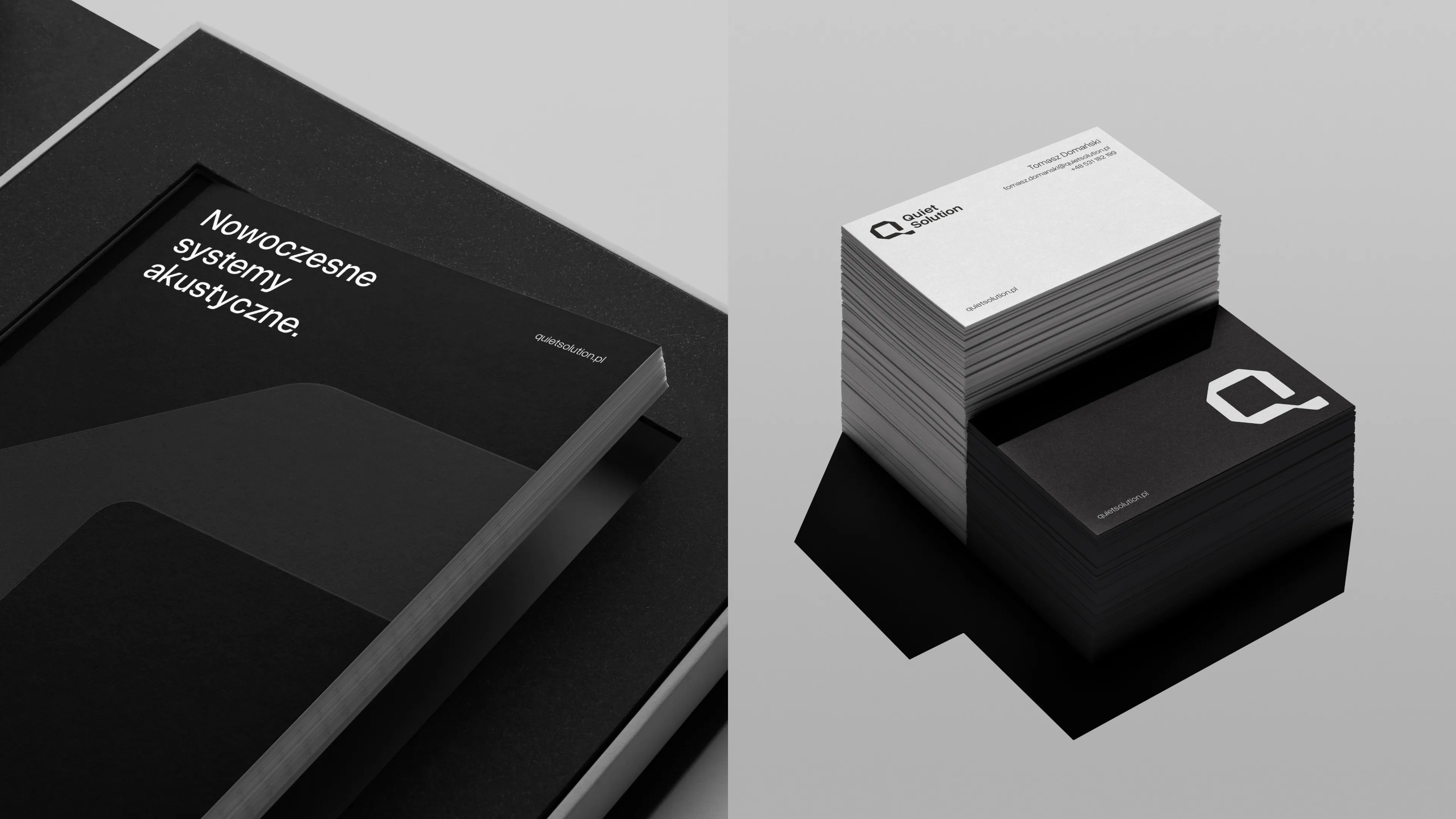 Projekt katalogu i wizytówek Quiet Solution w kontrastowej czerni i bieli z minimalistycznym układem.